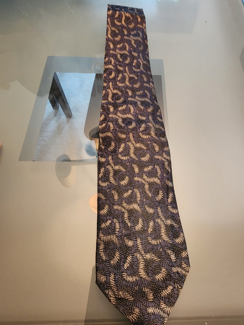 vintage Gianni Versace silk necktie featuring a blue and silver-toned abstract